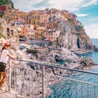woman visit Manarola Village, Cinque Terre Coast Italy. Manarola is a beautiful small colorful town province of La Spezia, Liguria, north of Italy and one of the five Cinque terre national park Italy
1213749700