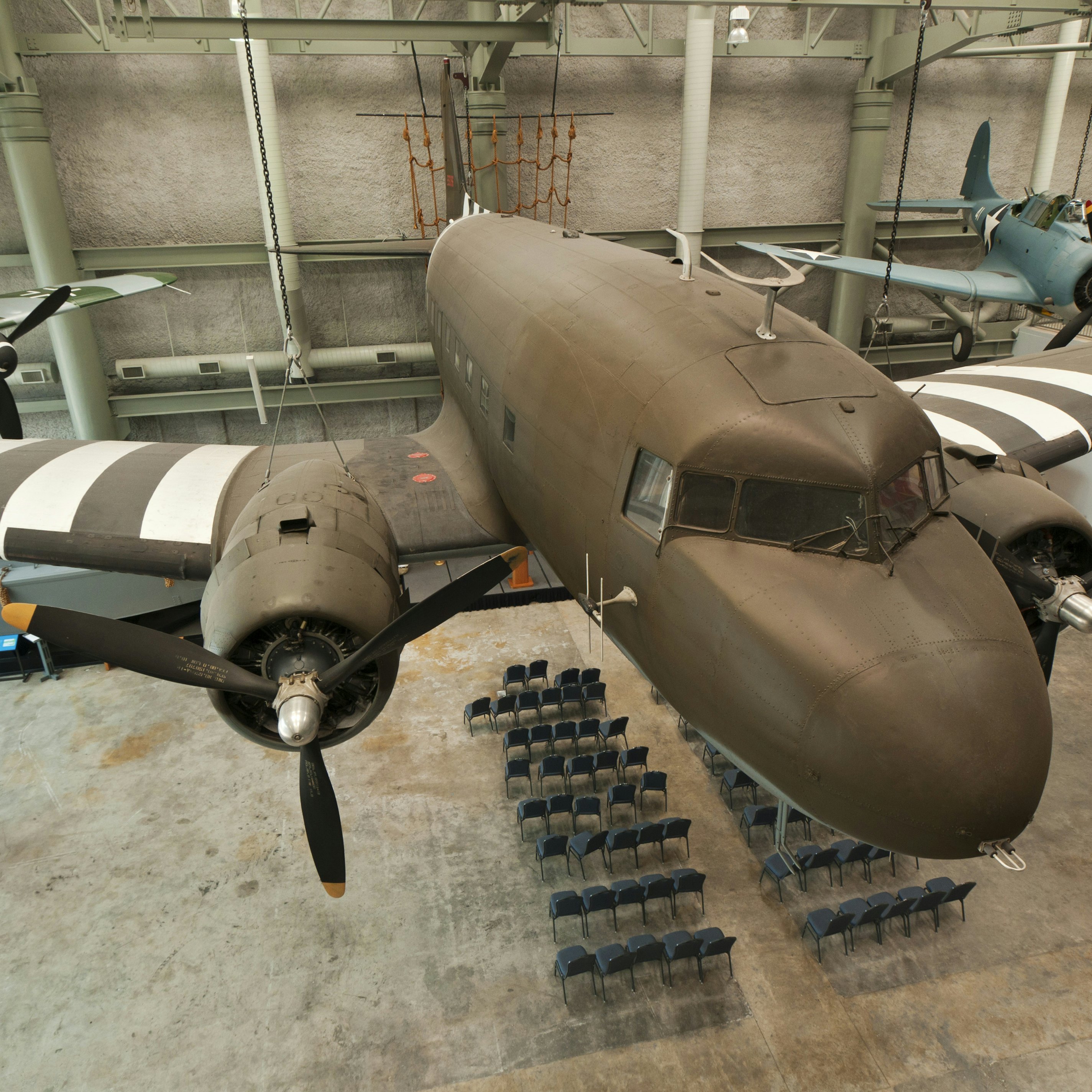 Douglas C-47 Dakota, transport glidertowning aircraft in D-Day markings at the National WWII Museum.