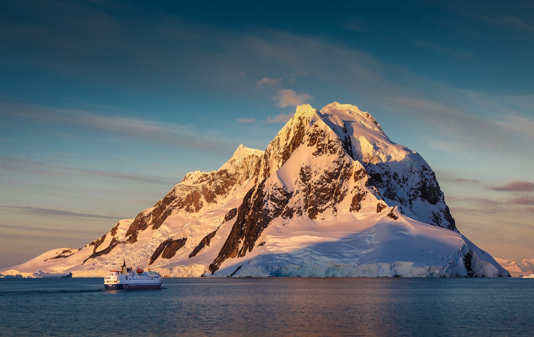 Ship entering the Lemaire Channel, Antarctica.
mountains, winter, boat, cold, travel, blue, clouds, summer, ship, snow, face, canon, mountain, ice, blue sky, peak, photography, slow, cruise, cruising, tall, southern ocean, davidmerronphotography, Antarctica, Sunset, Lemairechannel, Lemaire channel