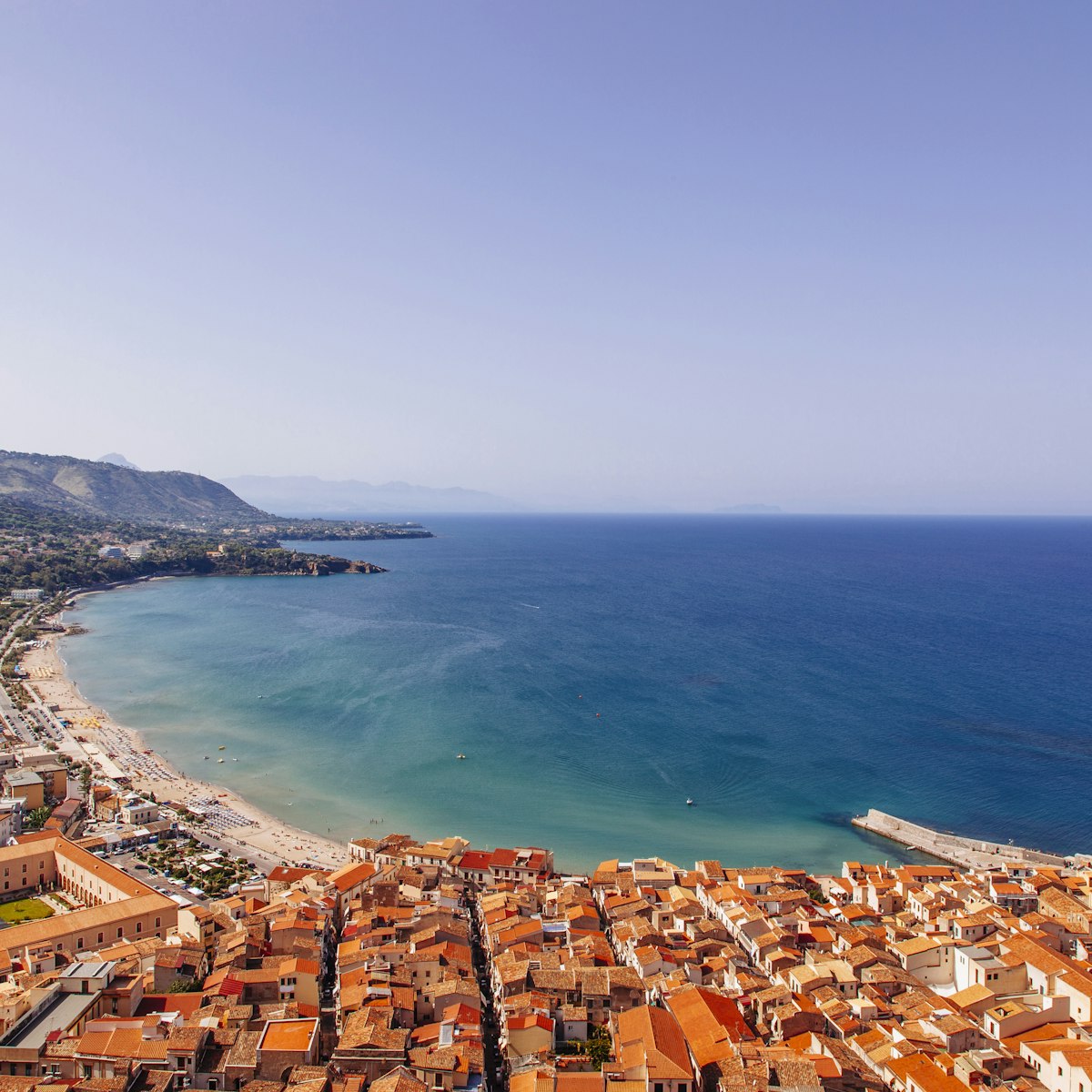 View of coastline and town of Cefalu, Sicily, Italy