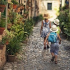 484168668
2015; 4-5 Years; 60595; 8-9 Years; 98212; Accuracy; Back to School; Bonding; Boys; Brother; Freedom; Full Length; Girls; Hat; Narrow; Old; Old Town; Spain; Spanish Culture; Street; Summer; Three People; Togetherness; Candid; Child; Childhood; Children Only; City; Horizontal; House; Outdoors; People; Tourism; Tourist; Town; Travel; Travel Destinations; Joy; Photography; Real People; Rear View; Vacations; Village; Visit; Weathered; Elementary Age; Europe; Family; Females; Lifestyles; Majorca; Males; Mediterranean Countries; Mediterranean Culture; Run; Rundown; Run-Down; Running; School; Sibling; Sister;
Three kids walking in the beautiful mediterranean town. Little boys are wearing backpacks and hats. Theirs sister is wearing sundress.