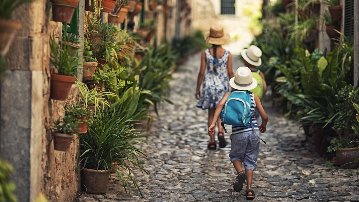 484168668
2015; 4-5 Years; 60595; 8-9 Years; 98212; Accuracy; Back to School; Bonding; Boys; Brother; Freedom; Full Length; Girls; Hat; Narrow; Old; Old Town; Spain; Spanish Culture; Street; Summer; Three People; Togetherness; Candid; Child; Childhood; Children Only; City; Horizontal; House; Outdoors; People; Tourism; Tourist; Town; Travel; Travel Destinations; Joy; Photography; Real People; Rear View; Vacations; Village; Visit; Weathered; Elementary Age; Europe; Family; Females; Lifestyles; Majorca; Males; Mediterranean Countries; Mediterranean Culture; Run; Rundown; Run-Down; Running; School; Sibling; Sister;
Three kids walking in the beautiful mediterranean town. Little boys are wearing backpacks and hats. Theirs sister is wearing sundress.