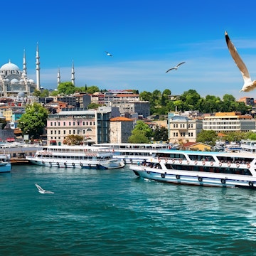 Ferries in the Golden Horn with the Suleymaniye Mosque in the background in Istanbul, Turkey.
