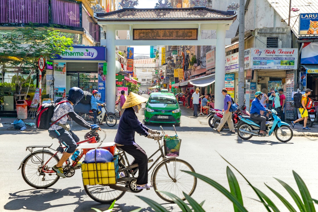 Ho Chi Minh City, Vietnam e January, 2017: street view of Pham Ngu Lao.street, the backpacker district of Saigon.; Shutterstock ID 569235004; Your name (First / Last): Laura Crawford; GL account no.: 65050; Netsuite department name: Online Editorial; Full Product or Project name including edition: HCMC & Nagasaki page images BiA
