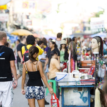 Westerner with Thai girl, Kao San Road, Banglamphu.