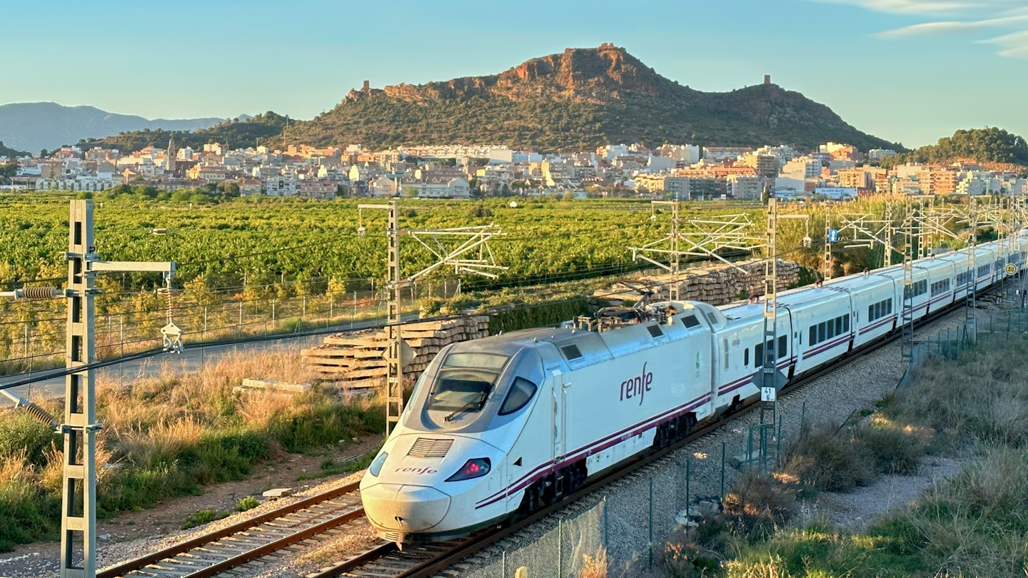 High-speed AVE train in motion on Valencia high-speed railway. Spanish Railways. RENFE SNCF - Spanish National Rail Network. Talgo 250 Dual train. April 12, 2023, Spain, Valencia region., License Type: media, Download Time: 2025-07-24T14:58:36.000Z, User: clairenaylor, Editorial: true, purchase_order: 65050 - Digital Destinations and Articles, job: online editorial, client: Spain trains, other: Claire Naylor