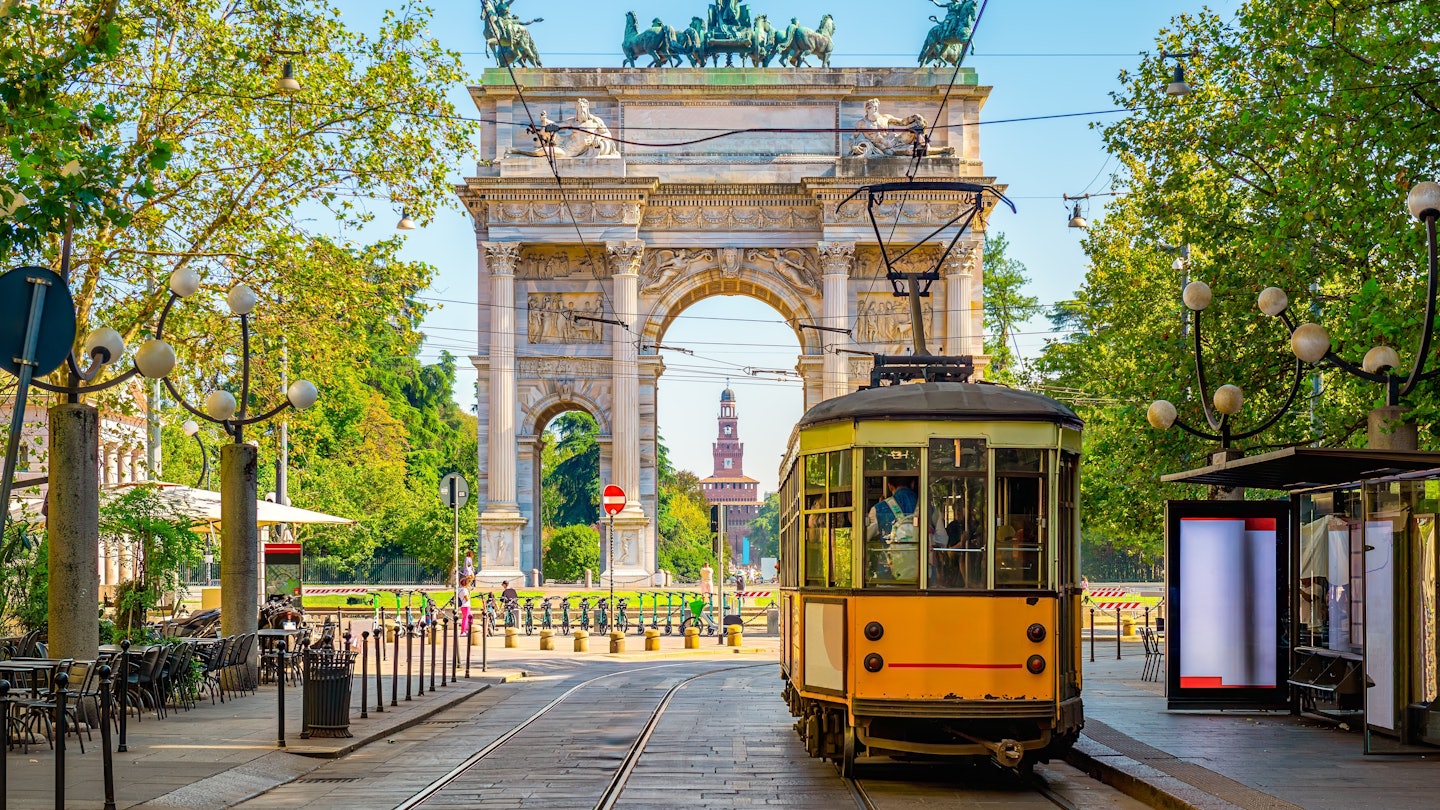 View of the Peace Arch with yellow tram in Milan, Italy, License Type: media, Download Time: 2024-11-19T13:43:36.000Z, User: Eointloughney87, Editorial: false, purchase_order: 56530 - Guidebooks, job: Global Publishing-WIP, client: Pocket Milan 6, other: Eoin T Loughney