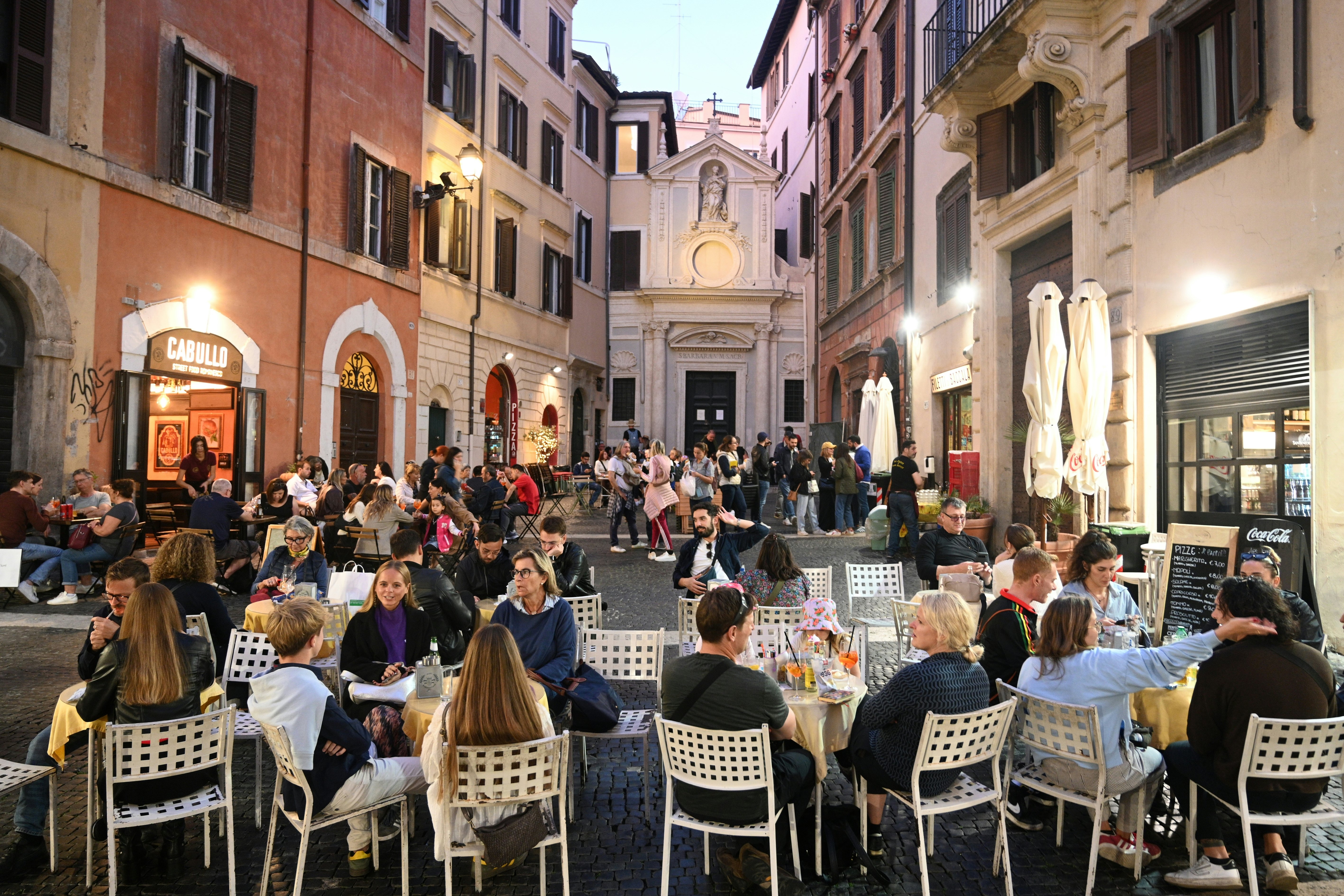 Rome, Italy - November 2, 2024: People relax in a cafe in the center of Rome