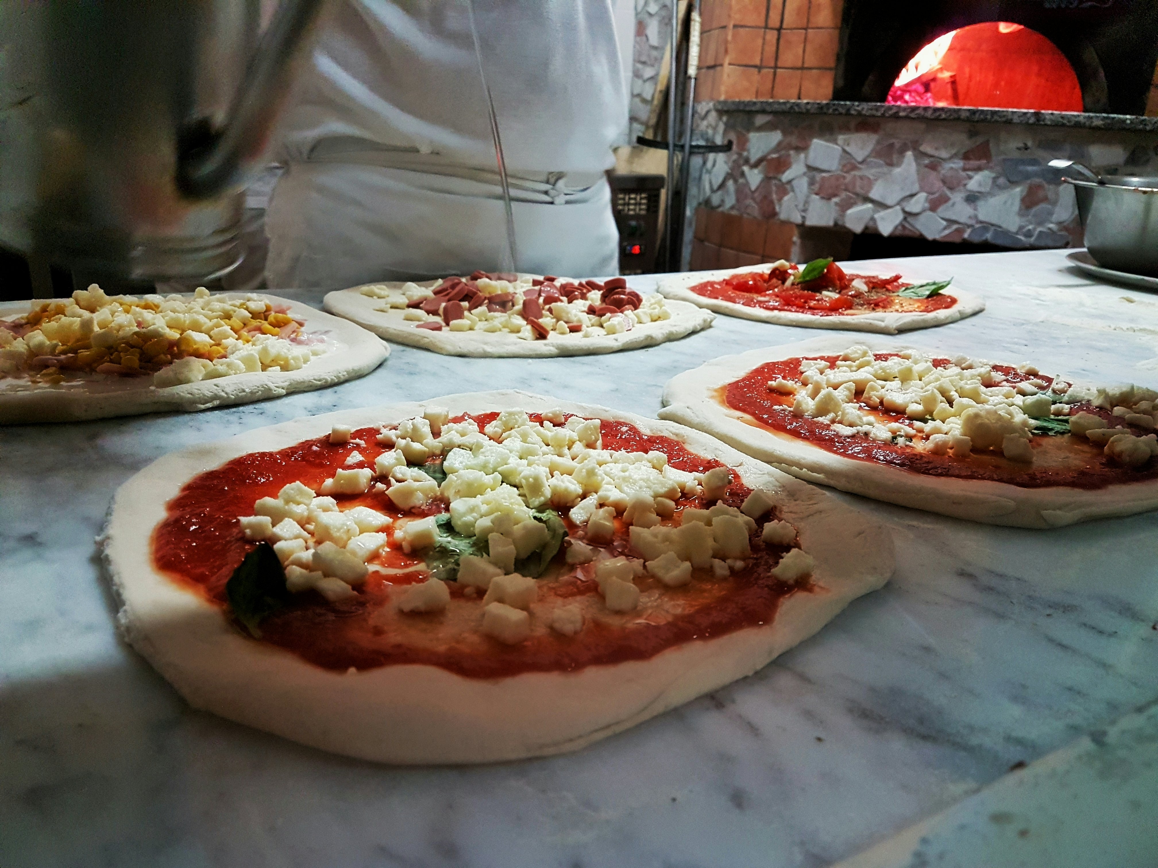 Preparing unesco real Pizza in Naples Italy