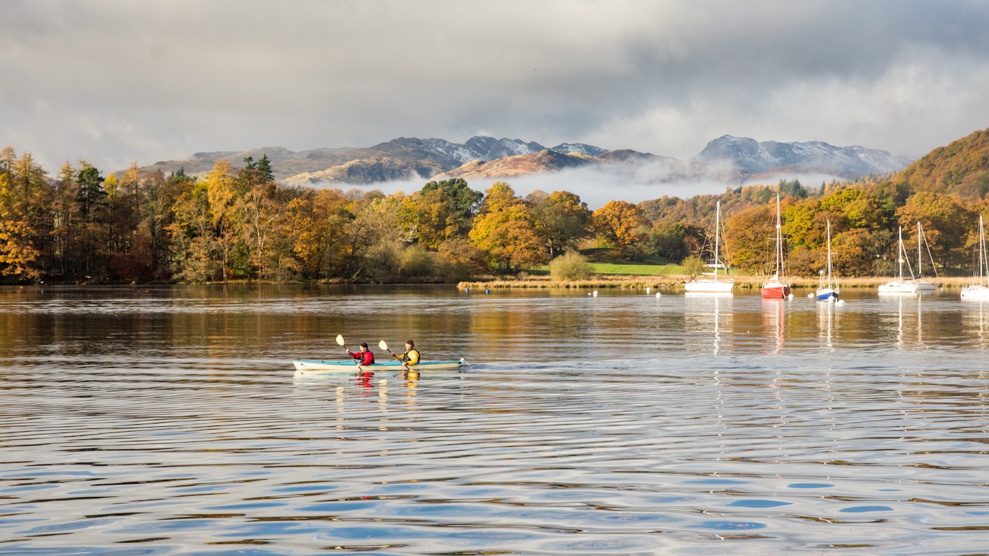 November 12, 2016: Two people paddle a canoe in Windermere lake at Ambleside.
1111423574
ambleside, autumn, boat, bow fell, britain, british, canoe, canoeing, cumbria, england, english, forest, great britain, lake, lake district, lake windermere, landscape, langdale, mist, mountain, national park, nature, recreation, sunny, tree, trees, uk, united kingdom, water, waterhead, windermere, woodland