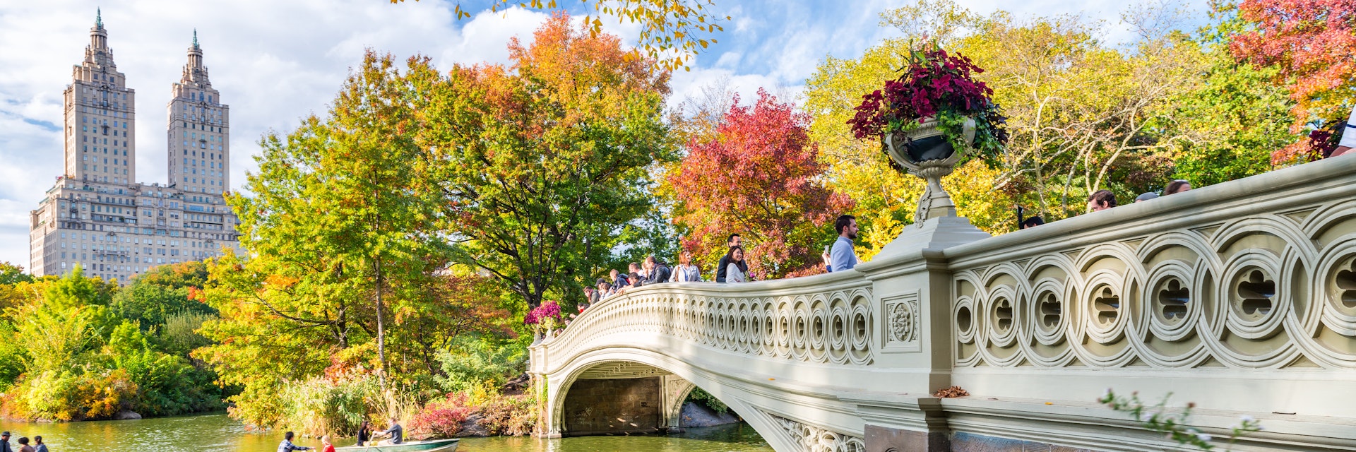 OCTOBER 2015: Visitors paddle in boats near a bridge at Central Park..