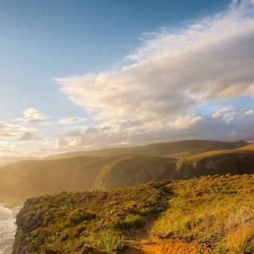 Misty beach in sunset light. Shot on the Otter trail in the Tsitsikamma National Park, Garden Route area, Western Cape, South Africa. ; Shutterstock ID 270602708; Your name (First / Last): Josh Vogel; Project no. or GL code: 56530; Network activity no. or Cost Centre: Online-Design; Product or Project: 65050/7529/Josh Vogel/LP.com Destination Galleries